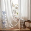 Natural linen sheer curtains draped in a window, showing light filtering and privacy assurance.