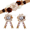 A set of floral maternity sash and corsage pins featuring roses in shades of brown, beige, and cream.