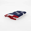 A folded heavy duty embroidered American flag banner displaying the stars and stripes pattern.