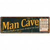 A vintage, weathered metal sign with the text Man Cave and various rules for entry.