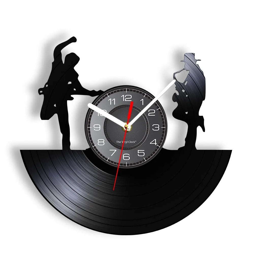 A black vintage vinyl record wall clock featuring silhouettes of a person and a bird on a record platter.