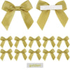 A set of golden satin ribbon bows with white adhesive backing for crafting and gift wrapping