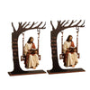 Wooden swing tabletop décor featuring Jesus with a Bible verse on a dark background.