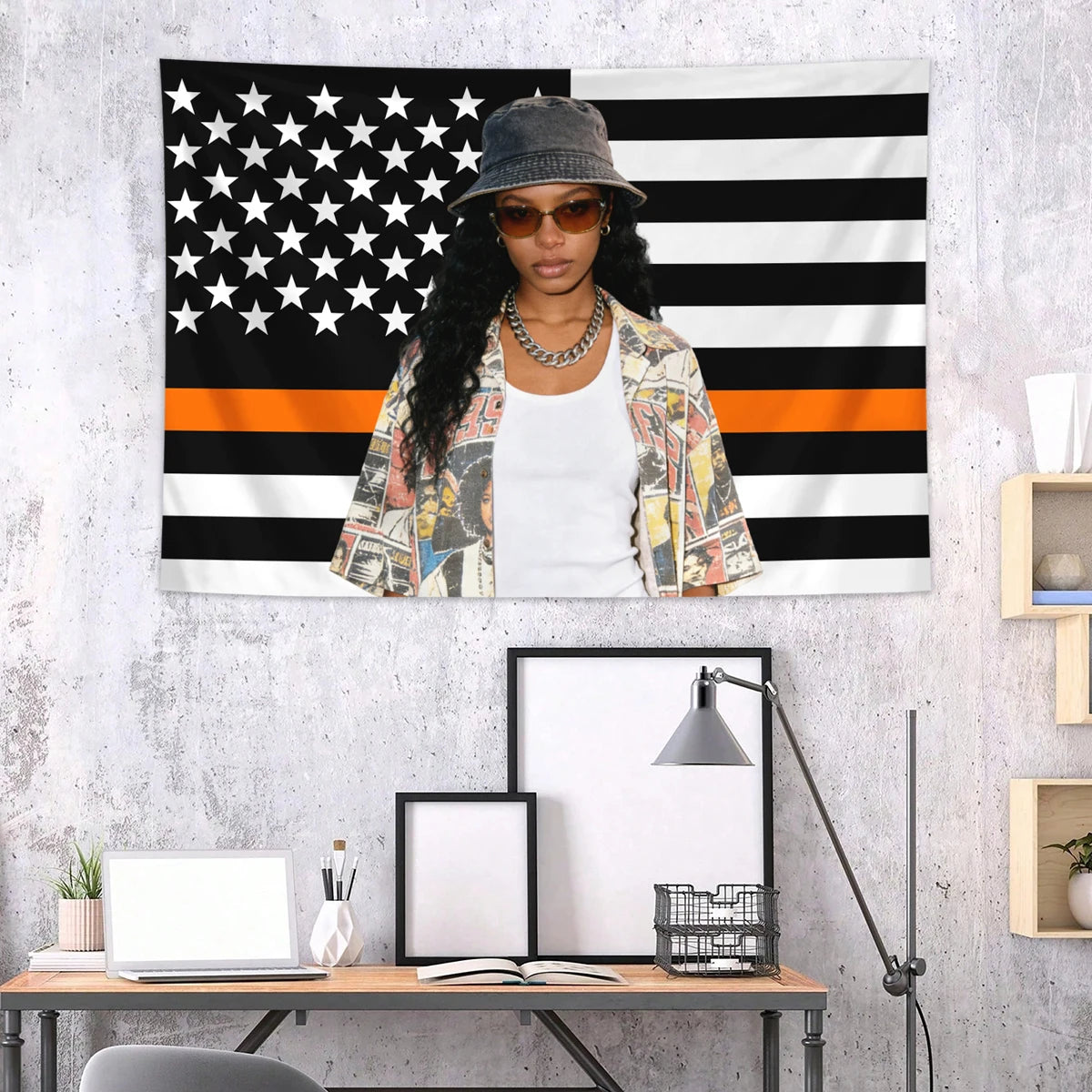 A woman wearing sunglasses and a patterned jacket stands in front of an American flag tapestry featuring stars and stripes.