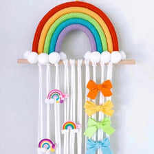 Rainbow hair clip organizer headband with a colorful rainbow arch and dangling clips