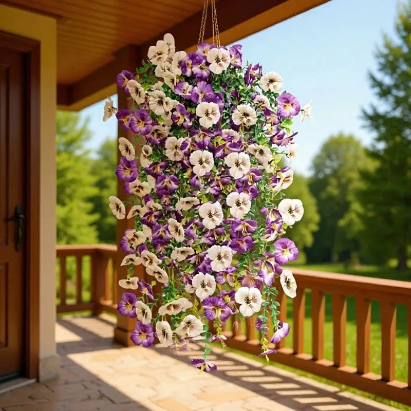 Artificial eucalyptus and violet pansy hanging vine cascading in a garden setting