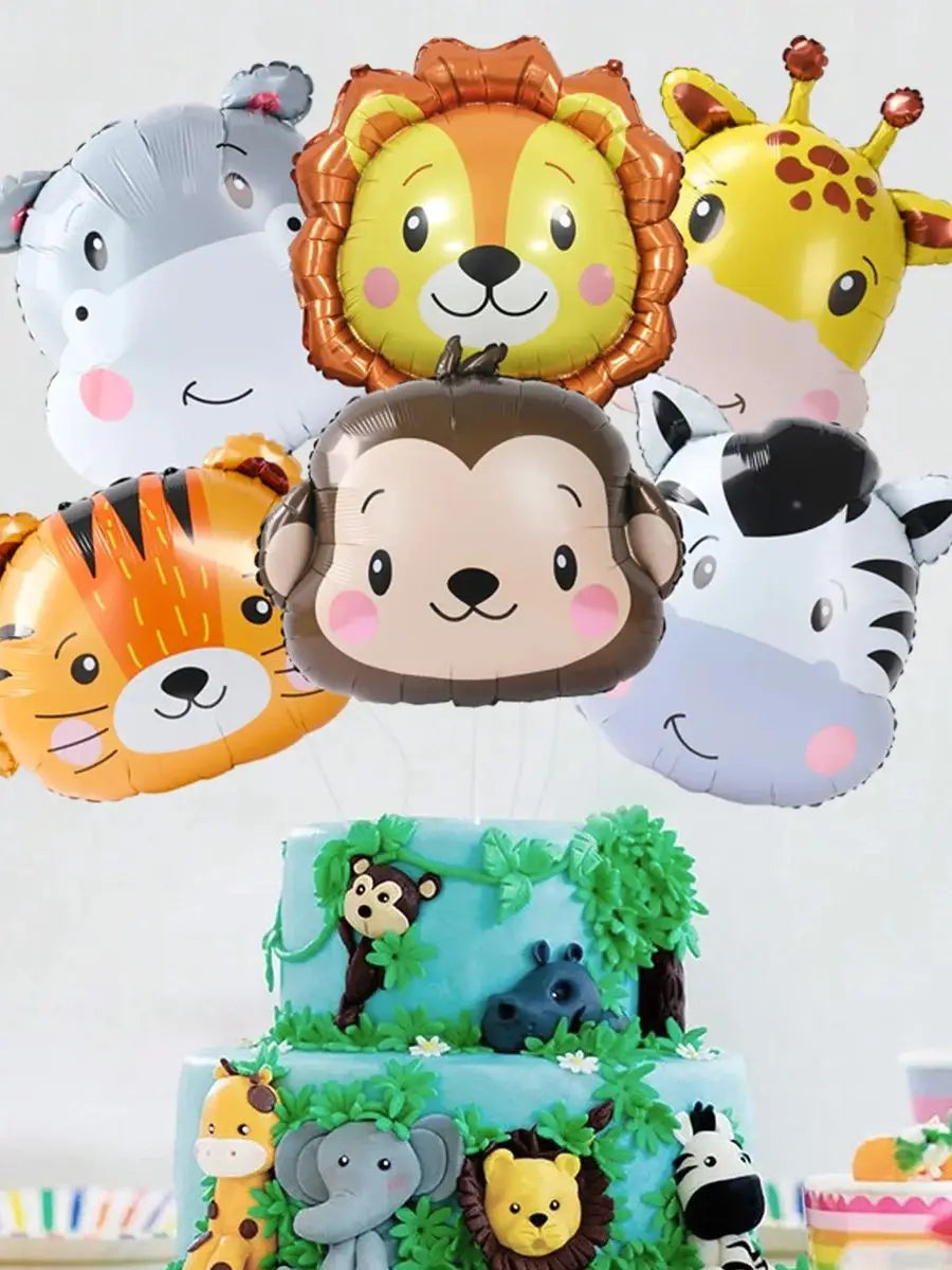A collection of foil balloons featuring cartoon jungle safari animals like a monkey, tiger, and lion.