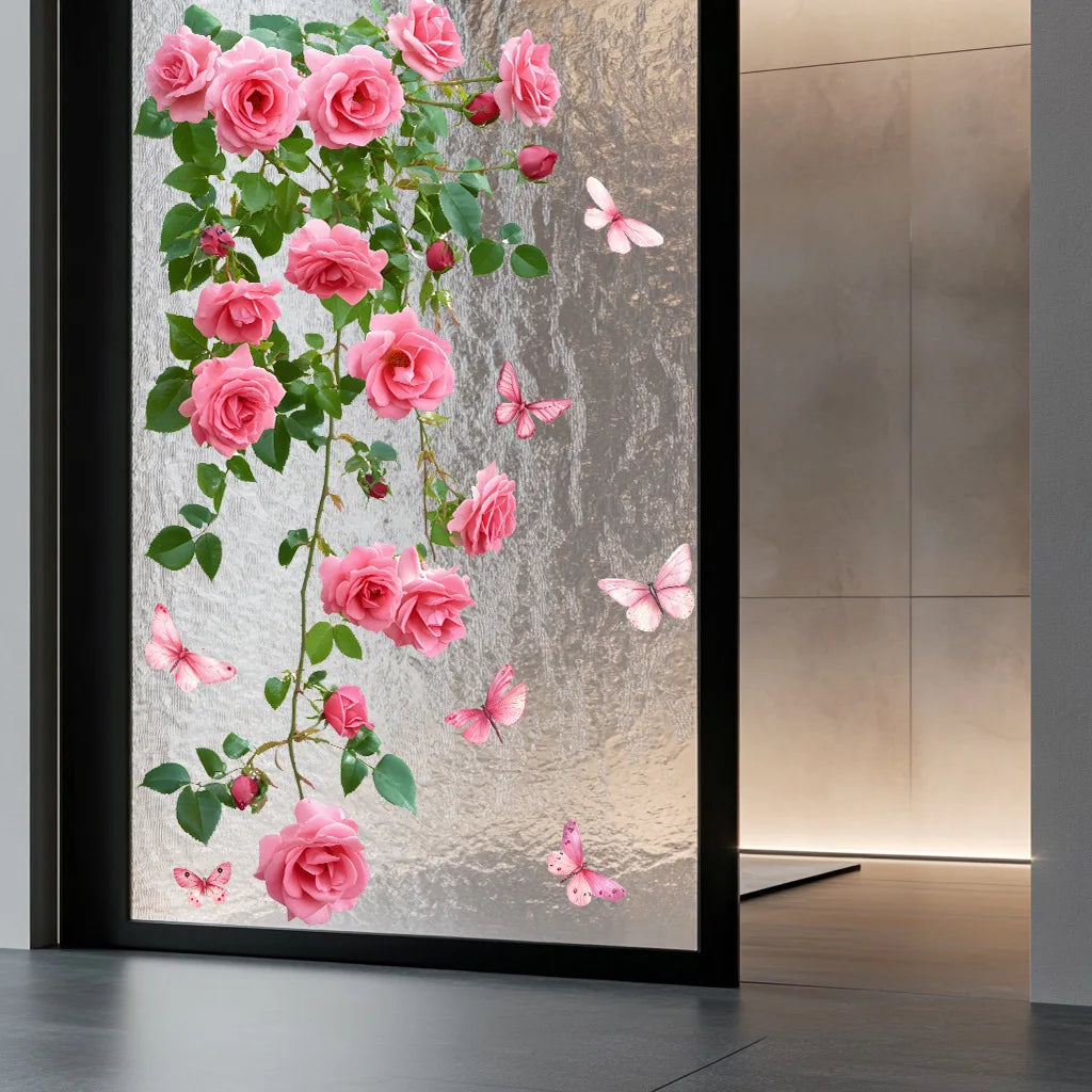 A close-up of a pink rose and butterfly floral window decal featuring lush pink roses and delicate butterflies on a clear bac