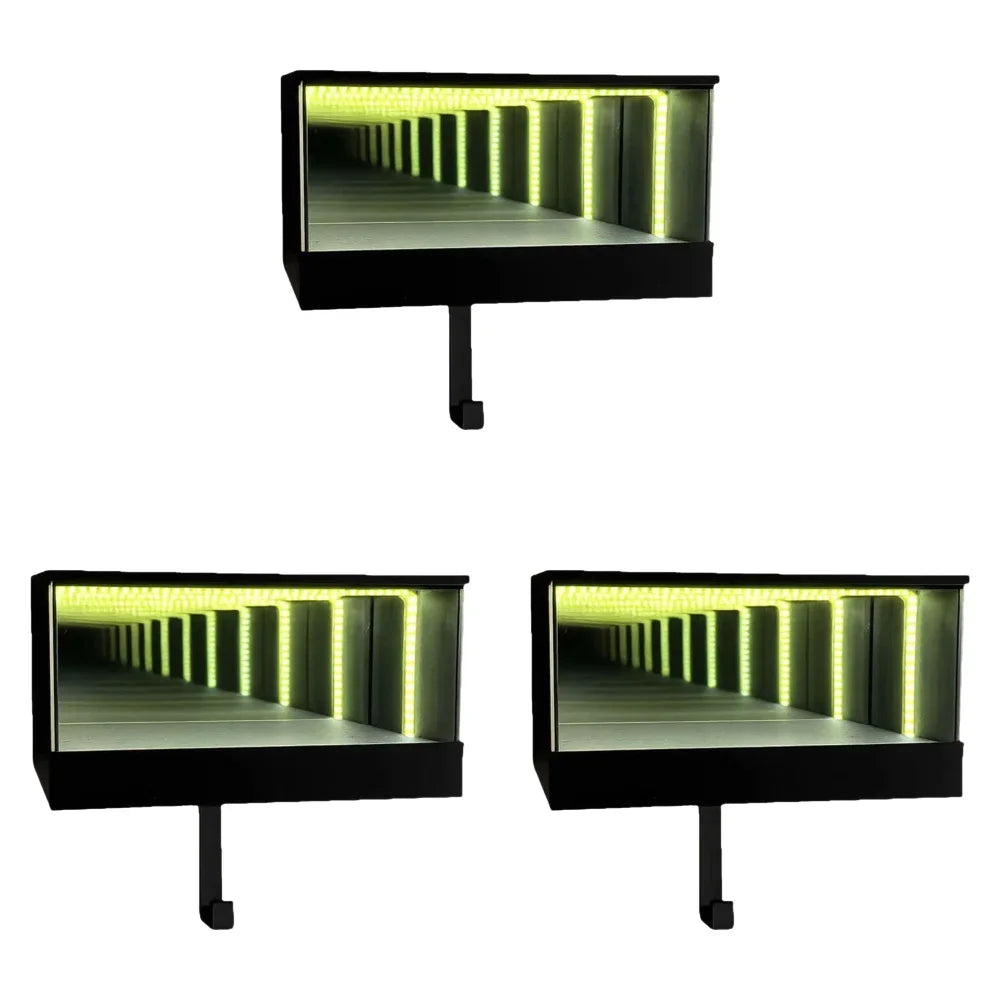 A black keychain holder featuring an LED tunnel effect light inside a mirrored compartment.