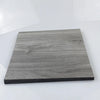 A rectangular piece of dark gray wood grain laminate or sticker material.