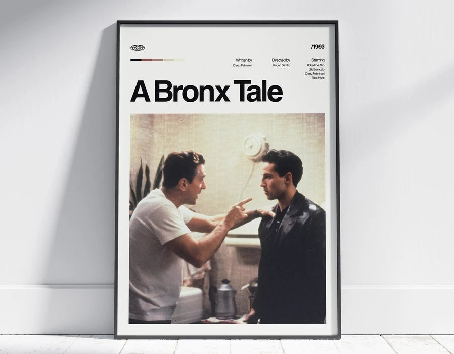A framed poster titled A Bronx Tale featuring two men interacting in a sepia-toned scene.