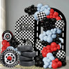 A balloon arch set featuring black, red, and blue balloons in a checkered pattern.