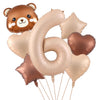 A set of foil balloons shaped like a bear and the number six in caramel and beige colors.