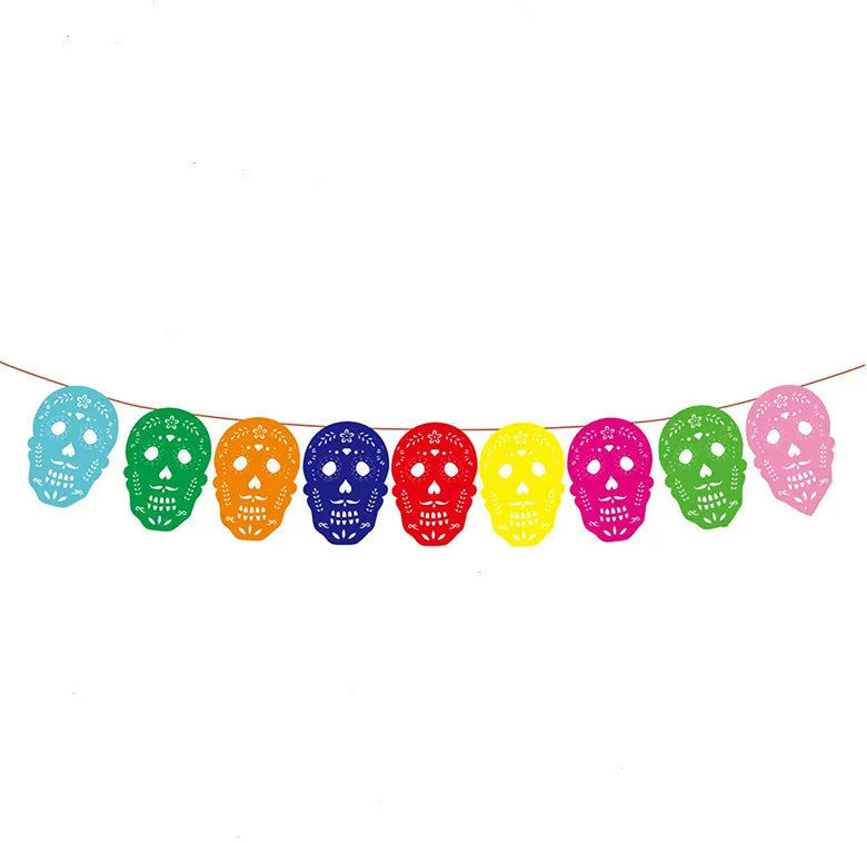 A string of colorful felt flags shaped like skulls in various bright colors for party decorations