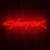 A neon sign spelling out CYBERPUNK is suspended against a dark red grid background.