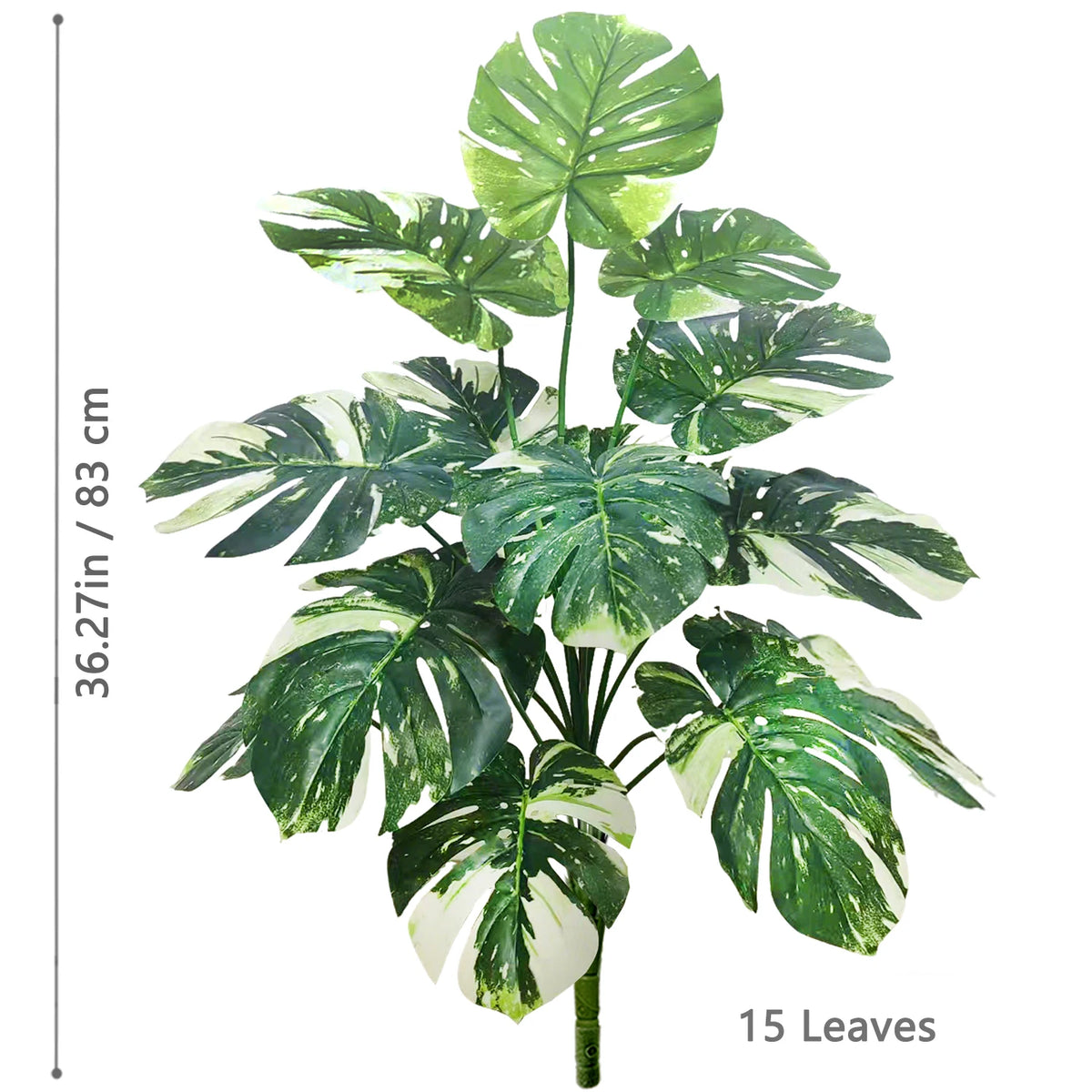 Artificial Monstera plant with silk green leaves shown against a white background.