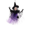 A scarecrow witch ornament featuring a black pointed hat, gray face, and purple tulle dress with black netting.