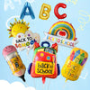 A set of colorful foil decorations including letters, a rainbow, and a backpack for a back to school theme.