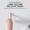 A hand touches a white fabric with a linen texture, demonstrating the delicate touch of the product.
