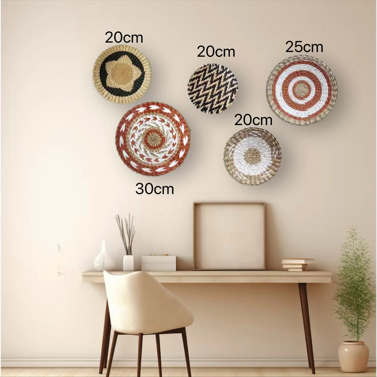 A collection of woven straw wall hangings in various sizes and patterns displayed on a light-colored wall.