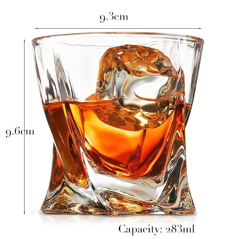 A heavy base tumbler glass filled with amber whiskey, showing the glass's dimensions and capacity.