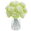 A bouquet of six artificial light green peony flowers arranged in a clear glass vase.