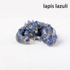 A natural crystal dragon figurine in shades of blue and gray for Feng Shui decor.