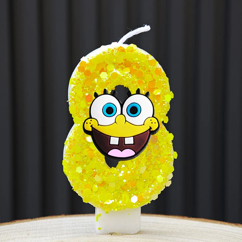A bright yellow sponge cake shaped like SpongeBob character with large eyes and a wide smile, set on a white base.