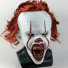 A realistic cute alien full-face latex mask with white skin, red hair, and an open mouth showing teeth.