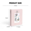 A pink rectangular photo album designed for instant cameras, showing its dimensions.