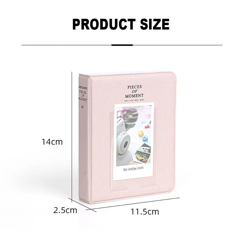 A pink rectangular photo album designed for instant cameras, showing its dimensions.