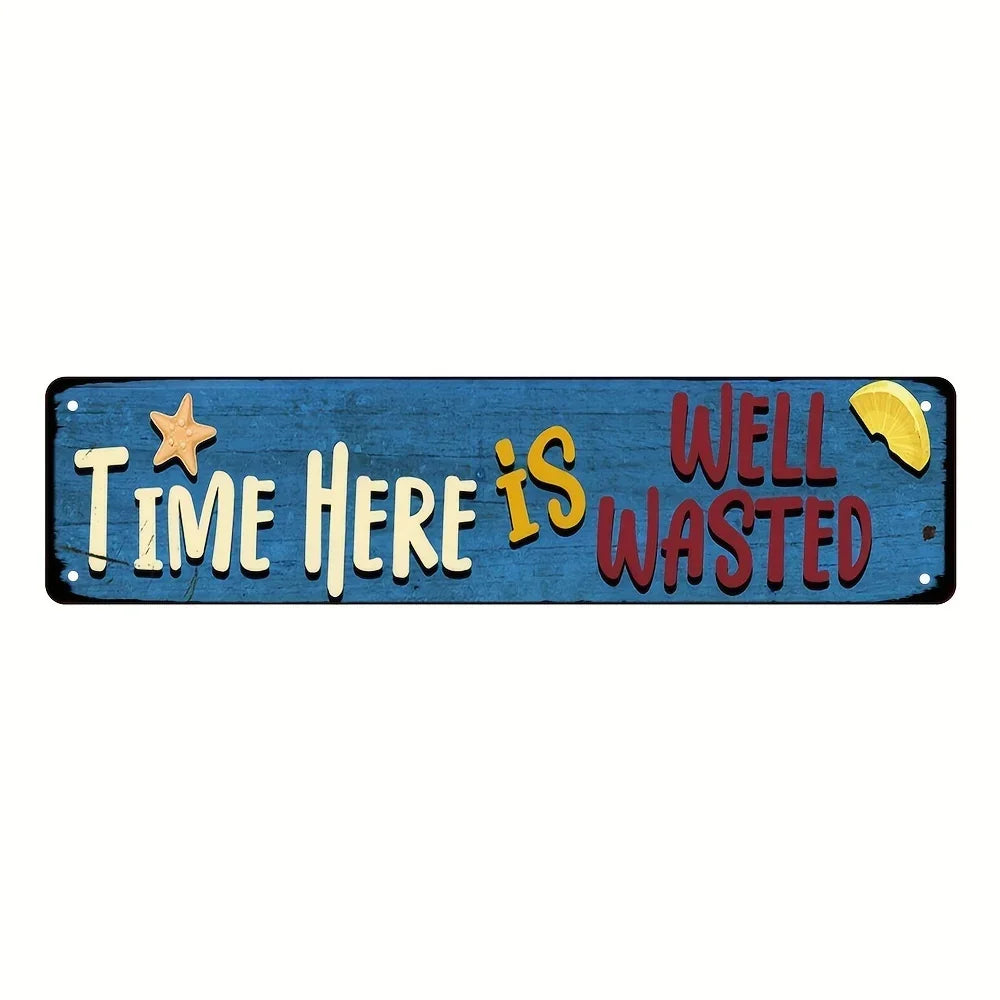 A blue metal sign with the text TIME HERE IS WELL WASTED carved into it, featuring a star and a slice of yellow fruit.