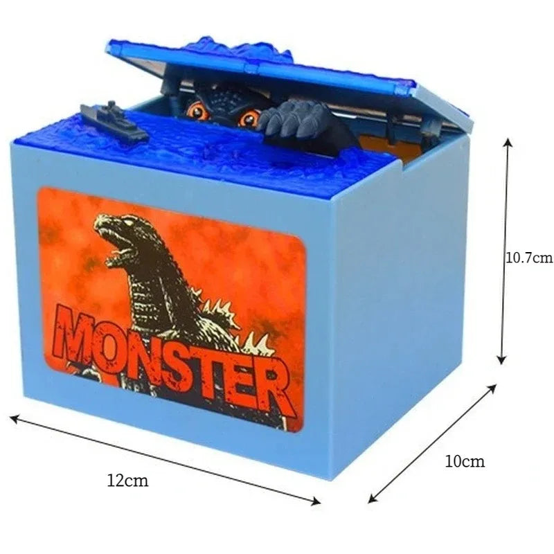 Blue resin piggy bank shaped like Godzilla with an opening and a black monster figure inside