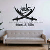 Black metal wall art featuring Arabic calligraphy of Zulfiqar sword with dimensions 40cm/15.75in above a light sofa.
