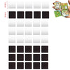 A set of black and white acrylic tiles with various sizes, including some decorated magnets.