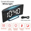 A curved LED screen alarm clock displaying 10:40 with various functions like alarm, snooze, switching, brightness adjustment,
