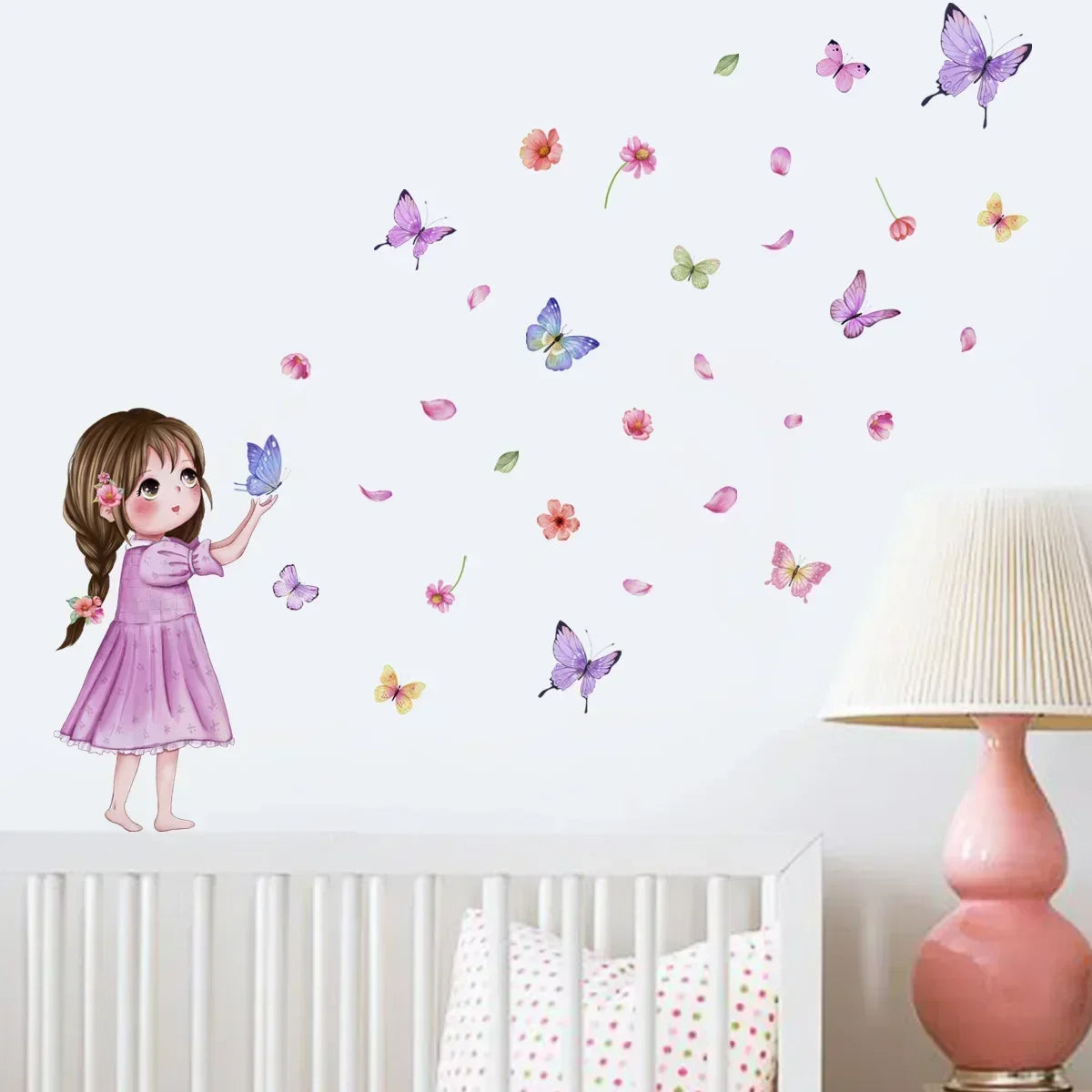 A girl with long brown hair is shown next to numerous colorful butterflies scattered across a white wall.