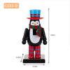 A wooden nutcracker soldier ornament with a blue hat, red and white striped jacket, and a green scarf.
