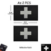 Two black reflective patches with silver crosses, measuring 5cm by 8cm each.