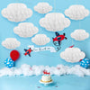 A set of white 3D cloud paper honeycomb ball decorations with red and blue accents on a light blue background.