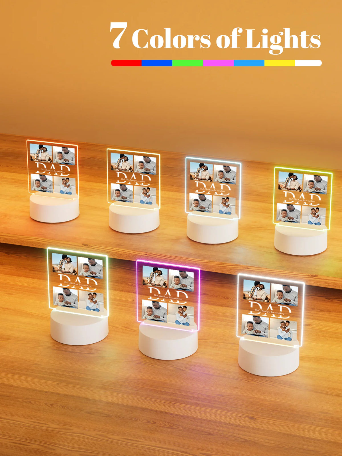 Seven colored acrylic night lights displaying personalized photos of a father and son.