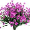 A bundle of vibrant purple pink artificial flowers used for home and event decoration.