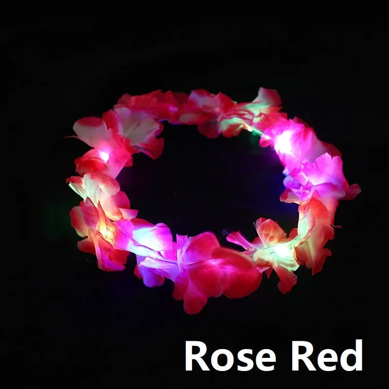 A glowing rose red flower crown headband against a black background.