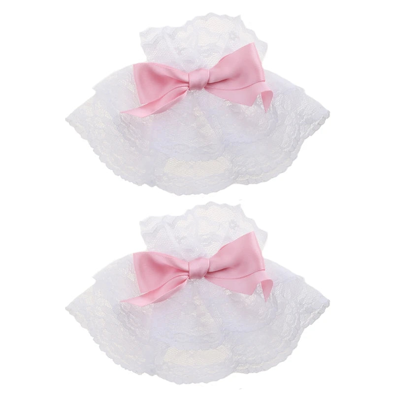 Pink ruffled lace wrist cuffs with a bowknot accent