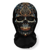A black fabric mask featuring an intricate, detailed skeleton face design with ornate patterns.