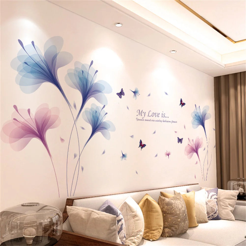 Wall stickers featuring watercolor-style pink and blue floral designs on a white wall.