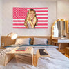 Sabrina Carpenter American Flag tapestry hanging above a bed with a mirror and wooden furniture