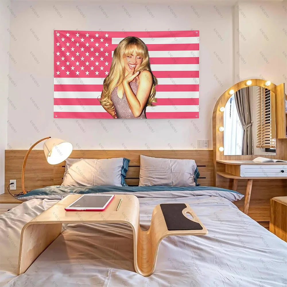 Sabrina Carpenter American Flag tapestry hanging above a bed with a mirror and wooden furniture