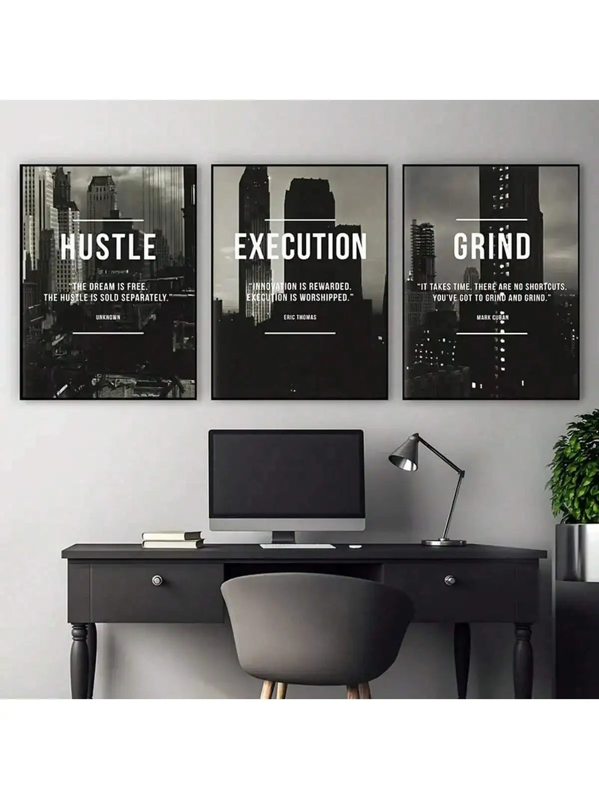 A set of three framed black and white motivational posters featuring text like Hustle Execution and Grind