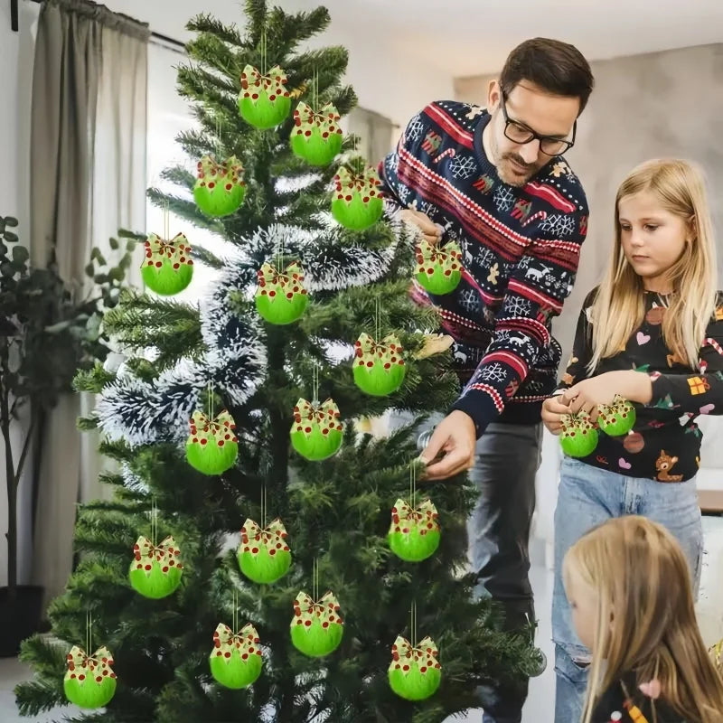 A woman decorating a Christmas tree with green faux fur ornaments featuring bows.